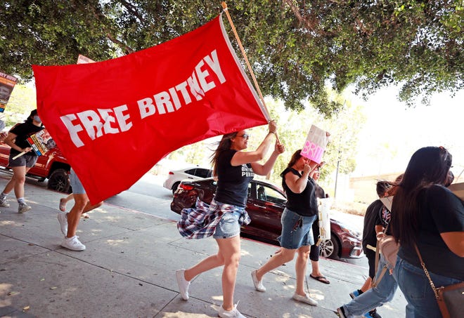 Protesters attend a #FreeBritney Rally on Wednesday in Los Angeles. The group is calling for an end to the 13-year conservatorship led by pop star Britney Spears’s father, Jamie Spears, and Jodi Montgomery, who have control over her finances and business dealings.