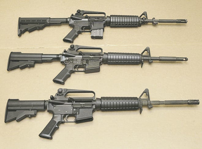 In this Aug. 15, 2012 file photo, three variations of the AR-15 assault rifle are displayed at the California Department of Justice in Sacramento, Calif. While the guns look similar, the bottom version is illegal in California because of its quick reload capabilities. Omar Mateen used an AR-15 that he purchased legally when he killed 49 people in an Orlando nightclub over the weekend President Barack Obama and other gun control advocates have repeatedly called for reinstating a federal ban on semi-automatic assault weapons that expired in 2004, but have been thwarted by Republicans in Congress. Rich Pedroncelli \ Associated Press