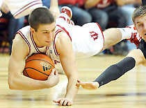 BLOOMINGTON — Indiana guard Daniel Moore dives for a loose ball against Purdue last season. (Herald-Times / Chris Howell).