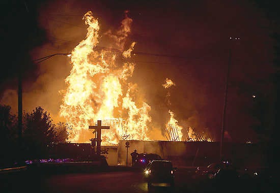 PETE SCHREINER | Times-Mail photosBedford firefighters battle a blaze at George’s Gateway True Value / Just Ask Rental on Saturday night. A fire was reported at the longtime business at about 7 p.m.