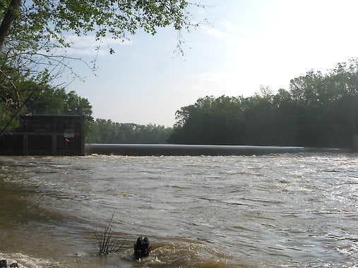 The rain-swollen White River flows over the dam at Williams. A company has proposed rebuilding the hydroelectric plant at Williams. It would use the power of the river to generate electricity. (Times-Mail / MIKE RICKETTS)
