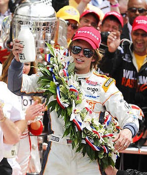 INDIANAPOLIS -- IndyCar driver Dan Wheldon, of England, celebrates with the traditional bottle of milk after winning the Indianapolis 500 auto race at the Indianapolis Motor Speedway in Indianapolis Sunday. (Associated Press)