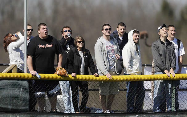 Fans watch Indiana\'s baseball team from beyond the left field fence at Sembower Field. Indiana will look for board of trustees approval this summer on a new baseball/softball complex. James Brosher | Herald-Times
