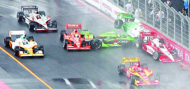 Panther Racing driver JR Hildebrand (rear) avoids a crash shortly after SundayÕs rain-soaked start of the Itaipava SÃ£o Paulo Indy 300 presented by Nestle. Hildebrand advanced from 22nd to 10th when the race resumed Monday. Indycar photo by Daniel Incandela.