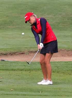 Martinsville senior Molly English chips close to the hole on No. 14 during Saturday’s regional at Foxcliff Golf Club. Photo by Melissa Dillon.