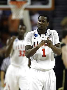 Illinois\' D.J. Richardson (1) celebrates during a timeout in the second half of a second-round game of the NCAA college basketball tournament against Colorado Friday, March 22, 2013, in Austin, Texas. Illinois beat Colorado 57-49. (AP Photo/David J. Phillip)