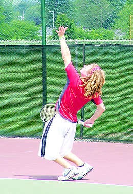 Blake Wareham (Martinsville) hits a serve during Mens Open Doubles Final. Wareham currently plays at Franklin College. Submitted photo.