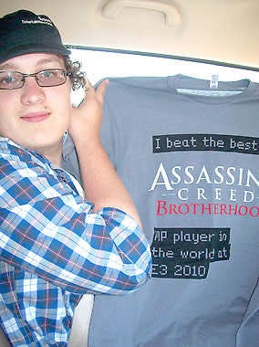 Josh Zipoff of Mooresville won a T-shirt for beating one of the E3 employees at a televised game segment of “Assassin’s Creed.” The 2010 Mooresville grad attended the E3 gaming conference in Los Angeles recently, thanks to the Make-A-Wish Foundation. He is now cancer free after undergoing chemotherapy for lymphoma. Submitted photo