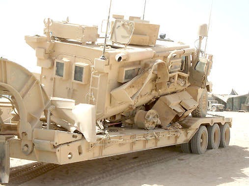 Jarod Overton and his crew endured a roadside bomb blast last year in Afghanistan, but because of the vehicle\'s MRAP design, their lives were saved. Overton, a Mooresville native, recently won the Purple Heart for his sacrifice. Submitted photo.
