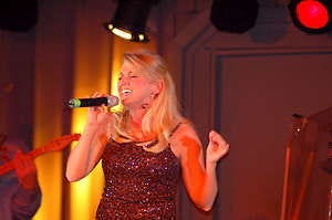 Courtesy photosBedford\'s JoAnna Kai Cobb sings at the Little Nashville Opry with the Little Nashville Express band. Cobb had performed there for about two years.