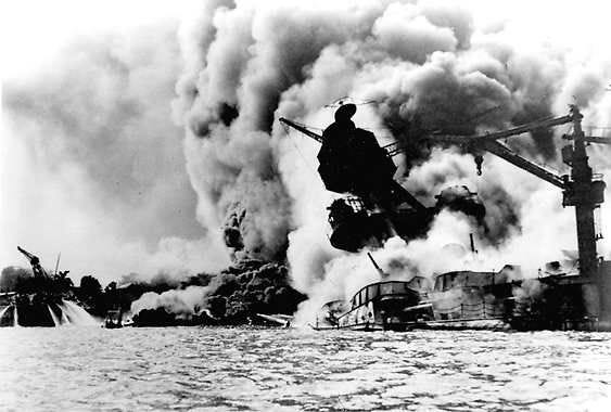 PEARL HARBOR, Hawaii — In this Dec. 7, 1941, file photo provided by the U.S. Navy, the USS Arizona is pictured in flames after the Japanese attack on Pearl Harbor in Pearl Harbor, Hawaii. The attack sank four U.S. battleships and destroyed 188 U.S. planes. Another four battleships were damaged, along with three cruisers and three destroyers. More than 2,200 sailors, Marines and soldiers were killed. (Associated Press / U.S. NAVY)