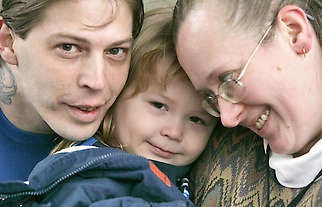 In this photo from Dec. 16, Heath Campbell, left, with his wife, Deborah, and son Adolf Hitler Campbell, 3, pose in Easton, Pa.Rich Schultz | Associated Press