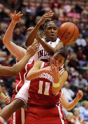 Indiana\'s Jori Davis goes for the rebound against Wisconsin. Monty Howell | Herald-Times.