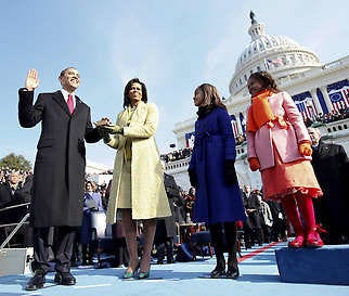 Barack Obama, left, takes the oath of office from Chief Justice John Roberts, not seen, as Obama’s wife, Michelle, holds the Lincoln Bible and daughters Sasha, right, and Malia, watch at the U.S. Capitol Tuesday in Washington, D.C.Chuck Kennedy | Associated Press