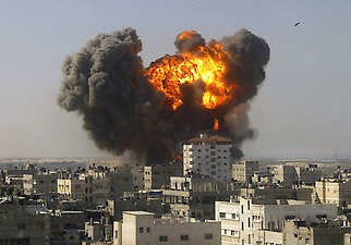 An explosion from an Israeli airstrike is seen Tuesday in Rafah, in the southern Gaza Strip. Egyptian and Palestinian officials said they hoped to negotiate a temporary halt in fighting. Israel planned to send a chief envoy to Egypt today to present Israel’s stance.Abdalrahem Khateb | Associated Press