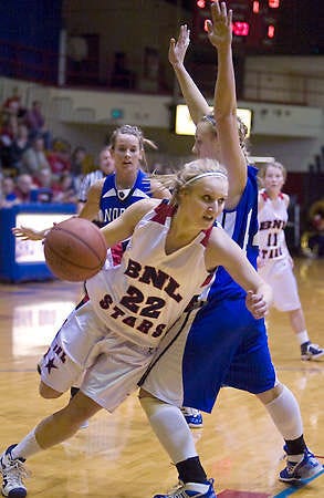 BEDFORD — BNL’s Tabi Terrell drives to the basket against North Harrison. (Times-Mail / PETE SCHREINER).