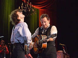 The Boss jams with a Seeger band banjo player at Verizon Wednesday night. Courtesy photo.