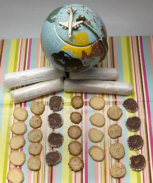 Easy-to-make cookies include, from left, Classic Icebox Cookies, Maple Pecan Bites, Chocolate Dreams and Cinnamon Walnut Crisps, which are shown below frozen rolls of cookie dough and a world cookie jar.David Snodgress | Herald-Times