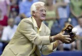 Milwaukee Brewers radio announcer Bob Uecker catches the ceremonial first pitch Aug. 27 before the baseball game between the Atlanta Braves and Milwaukee Brewers. Morry Gash | Associated Press