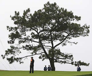 Tiger Woods waits to putt on the 12th green during a practice round Tuesday for the U.S. Open at Torrey Pines Golf Course in San Diego. Woods is making his first start since the Masters when the tournament begins today.Chris Carlson | Associated Press