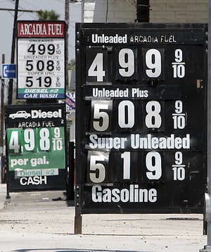 Self-serve regular gasoline is advertised Friday at just under $5 per gallon at a service station in Arcadia, Calif., with no relief in sight.Reed Saxon | Associated Press
