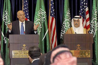 U.S. Treasury Secretary Henry Paulson, left, speaks at a press conference with Saudi Finance Minister Ibrahim al-Assaf following a meeting Saturday in Jiddah, Saudi Arabia. Saudi Finance Minister Ibrahim al-Assaf said his country has no intention of de-pegging its currency from the weakening U.S. dollar. Associated Press