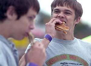 Times-Mail file photosPAOLI — Teavin Ewen, left, and Tyler Copeland compete in the Ultimate Burger Eating Challenge in this October 2007 file photo. Orange County House of Prayer set up the fundraiser, and the money went to the winning school team.