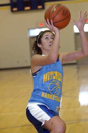 MITCHELL — Ariel Cockerham drives in for a layup during girls basketball season-opening practice Monday at Mitchell High School. (Times-Mail / GARET COBB).