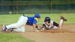 Edgewoods Scott Pedersen (right) is safe at second base as Crawfordsvilles Ross Wheeler (21) tries to tag him out during Tuesday nights regional baseball game in Ellettsville. Crawfordsville won the game, 13-1. Jeremy Hogan | Herald-Times