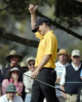 Zach Johnson gives a wave to the crowd as they yell birthday wishes to him on the seventh green during his semifinal match against Davis Love III at the World Golf Championship Saturday.Chris Park | Associated Press