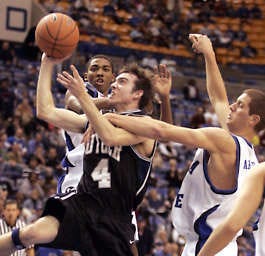 Butler’s A.J. Graves, a former White River Valley star, puts up a shot against Indiana State’s Adam Arnold (right) and Harry Marshall, a former Owen Valley standout, Saturday’s game in Terre Haute. Indiana State handed Butler its first loss, but the Bulldogs held on to their Top 20 ranking this week. Tom Strattman | Associated Press