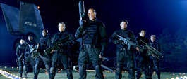 The Kid (Al Weaver, left), Duke (Raz Adoti), Destroyer (Deobia Oparei), Portman (Richard Brake), Sarge (Dwayne "The Rock" Johnson), Reaper (Karl Urban), Mac (Yao Chin) and Goat (Ben Daniels) are members of an elite Marines\' unit who respond to a distress signal from a remote science facility on a distant planet in "Doom." Universal Studios | Associated Press