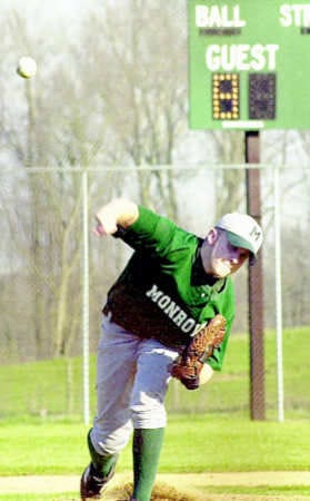 Monrovia pitcher Sam Brooks delivers a pitch during Monday night\'s baseball season opener with South Putnam in Monrovia. The visiting Eagles defeated the Bulldogs 11-0. Photo by Scott Roberts.
