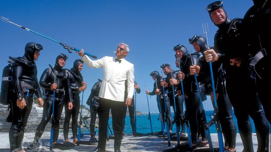 1. Thunderball (1965)     • Domestic box office:  $477.5 million     • IMDb rating:  7.0     • Rotten Tomatoes audience score:  73%     • Starring:  Sean Connery, Claudine Auger, Adolfo Celi, Luciana Paluzzi This top-grossing Bond film has all the elements of what makes a Bond film a Bond film -- exotic locations, thrilling action sequences (this time mostly done underwater), and a madman who wants to rule the world. SPECTRE is at the center of a plan to steal two NATO atomic bombs and hold them for ransom. Yet this time,   Blofeld isn't the instigator; it's another SPECTRE member, Emilio Largo.     ALSO READ: This Is Every James Bond Movie Ranked Worst To Best