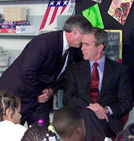 President Bush\'s chief of staff, Andy Card, whispers into the ear of the president to give him word of the plane crashes into the World Trade Center during a visit to the Emma E. Booker Elementary School in Sarasota, Fla., in this Sept. 11, 2001, file photo.Doug Mills | Associated Press