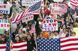 People against proposed changes in United States immigration laws march April 2 in Fort Wayne. Cathie Rowand | Associated Press