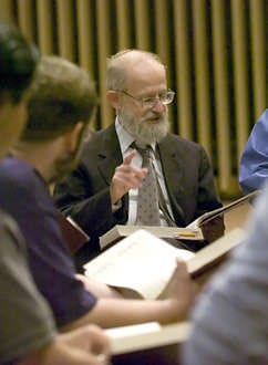 David Rust leads a song as the Sacred Harp group rehearses in the St Mark\'s sanctuary. Singers will move their hand up and down to the beat of the music The voice is the only instrument in shape-note music. David Snodgress | Hoosier Times