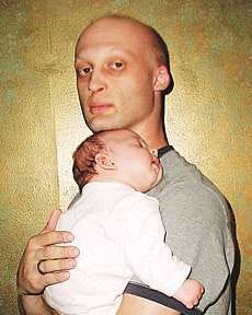 James Laster holds his baby, Lilliana. Courtesy photo