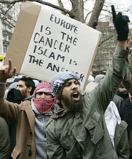 Muslim protesters chant slogans Friday during a demonstration outside the Danish embassy in London, where hundreds of people protested against the publication of cartoons depicting the Prophet Muhammad. Lefteris Pitarakis | Associated Press