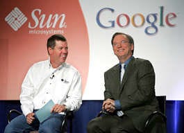 Sun Microsystems Inc. chief executive Scott McNealy, left, and Google Inc. chief executive Eric Schmidt, give a news conference in Mountain View, Calif., Tuesday. Google took a big step toward challenging Microsoft Corp.\'s dominance in computer word-processing and spreadsheets with the announcement Tuesday that it would distribute Java technology from Sun Microsystems. AP photo | Paul Sakuma