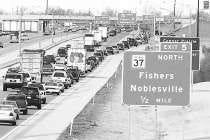 Afternoon rush hour traffic clogs Ind. 37 at the Fishers exit north of Indianapolis. AP Photo.