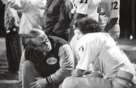 Bloomington North coach Wayne Nichols talks with QB Steve Corso file photo | Hoosier Times