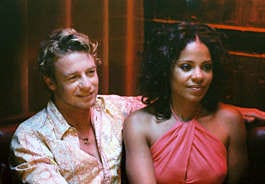 Kenya (Sanaa Lathan, left) finds herself falling in love with her landscaper Brian (Simon Baker) in "Something New." Sidney Baldwin | Focus Features