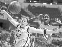 Purdue\'s Emily Heikes (52) and Ohio State\'s Jessica Davenport (50) battle for a rebound during the first half of their Big Ten semifinal game at Conseco Fieldhouse in Indianapolis Sunday. The Boilermakers won 67-61. AP Photo.