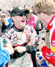 Kenny Wallace (left) shares a laugh wit Sterling Marlin before the start of Sunday\'s Virginia 500 at the Martinsville Speedway. Wallace replaced Kevin Harvick in the race after Harvick was barred from competing by NASCAR shortly before the race. AP photo