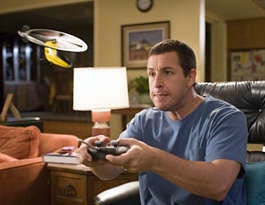 Michael Newman (Adam Sandler), a workaholic architect, comes across a universal remote that allows him to mute more than commercials in \'Click." Tracy Bennett | Columbia Pictures