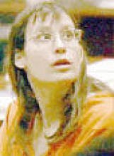 Andrea Yates sits in the courtroom during her competency hearing in Houston, Friday, Sept. 21, 2001, in this image from television. Yesterday, Yates was found guilty of drowning her five children and could get the death penalty. Associated Press photo