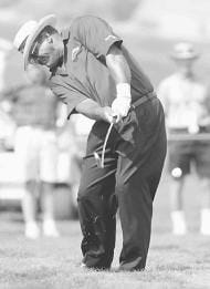 Jim Thorpe hits from the rough on the 18th hole during the final round of the Senior Tradition. Thorpe won in a playoff over John Jacobs. AP photo