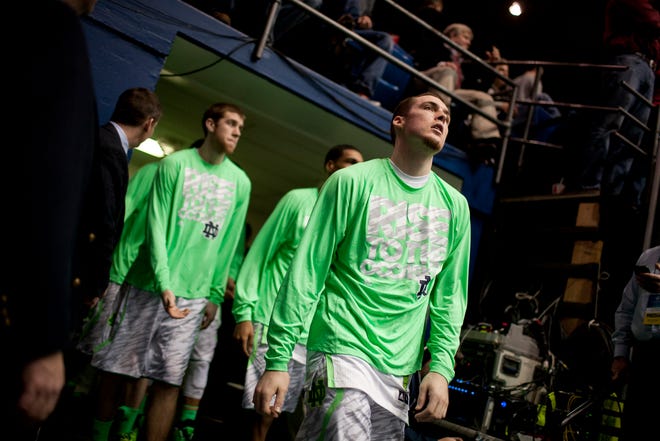 South Bend Tribune/JAMES BROSHER Notre Dame guard/forward Pat Connaughton and teammates take the floor for a second-round game in the NCAA college basketball tournament on Friday, March 22, 2013, in Dayton, Ohio. via FTP
