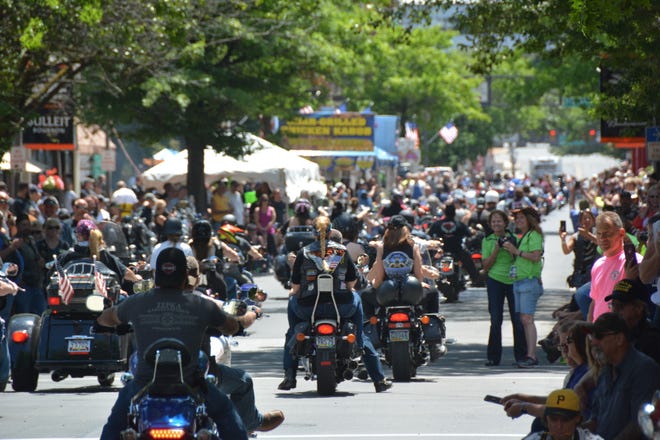 Thousands of motorcycles and people flooded into Johnstown on Saturday for Thunder in the Valley. About a hundred motorcycles there rolled down Main Street for the annual parade as thousands lined the streets.
